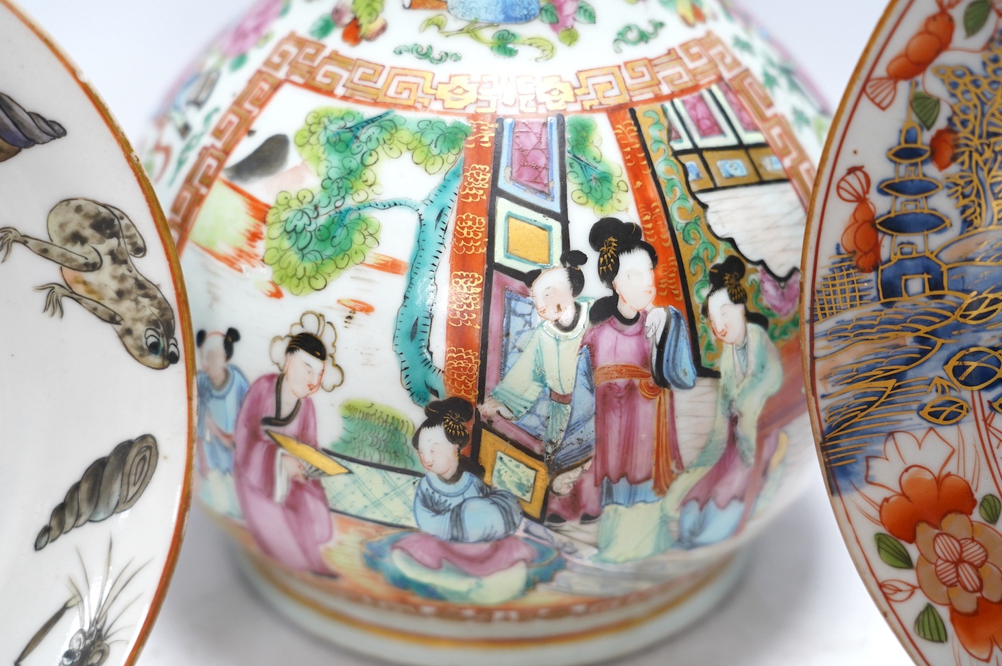 A 19th century Chinese famille rose bottle vase together with four plates, vase 28cm high. Condition - ranging from fair to good